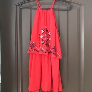 Orange Romper w/ Beautiful Blue Designs  .